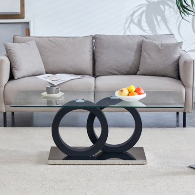 Table basse de style moderne avec plateau en panneau de fibres à densité moyenne avec base noire, convient aux salons et aux espaces détente, avec des dimensions de produit de 47,2 x 25,6 x 17,8 pouces.