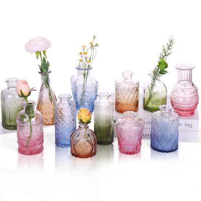 Ensemble de 12 vases en verre à bourgeons en verre