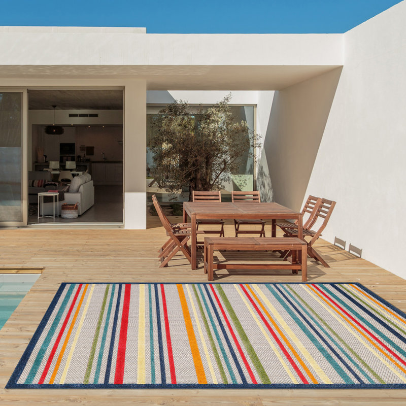 Tapis intérieur / extérieur rayé bleu et ivoire 2 pi x 4 pi résistant aux taches