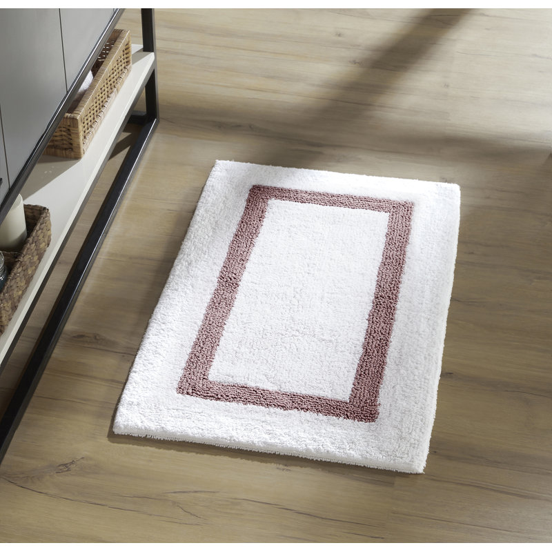 Tapis pour salle de bain réversible 100% coton Widman, doux et super absorbant, lavable à la machine pour la douche, la baignoire et le lavabo, rectangle 21 po x 34 po, blanc / rose