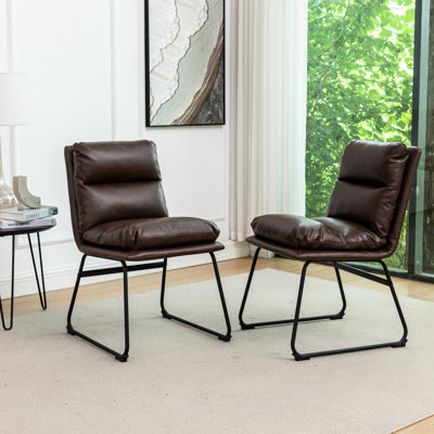 Upholstered Dining Chairs, Of 2 In Antique Brown. Sled Base For Steadiness. Overfilled Seat Relaxation. Faux Leather Upholstery. Metal Build. Wipe Cle