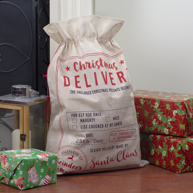 27 pochettes cadeau "Livraison de Noël" beige et rouge
