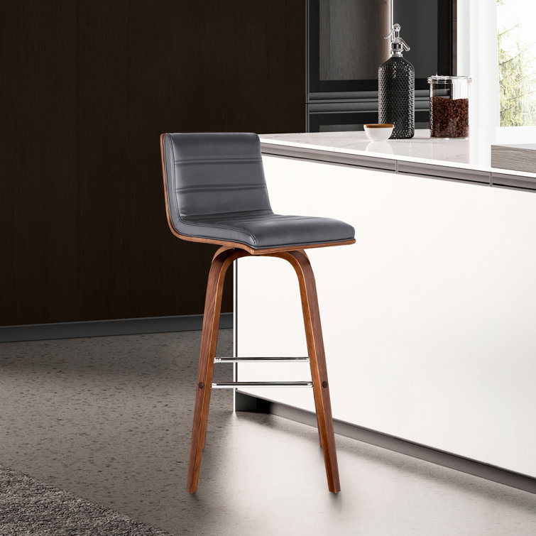 Aluin Mid-century Modern Swivel Counter or Bar Height Bar Stool in Faux Leather and Wood