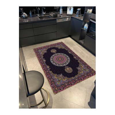 Tapis décoratif mauve