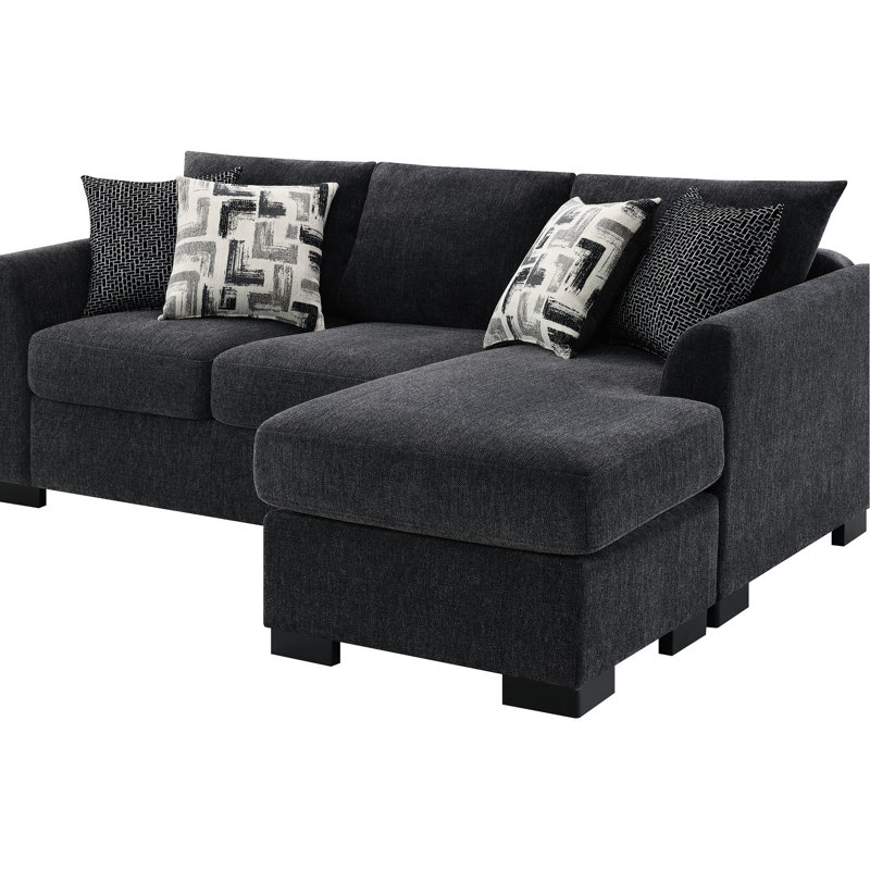 Canapé d'angle convertible gris foncé avec accoudoirs arrondis, siège à ressorts ensachés et quatre coussins décoratifs contemporains - Configuration