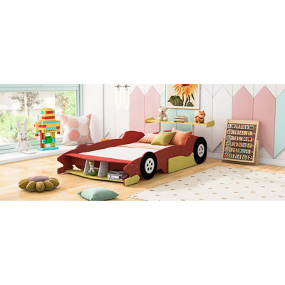 Lit plateforme en forme de voiture de course rouge avec roulettes