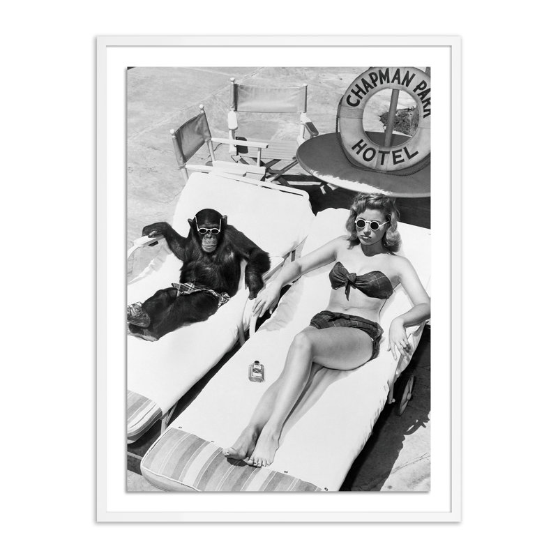 Woman Sunbathing With Chimpanzee by Getty Images, 48" H x 36" W, White Maple Framed