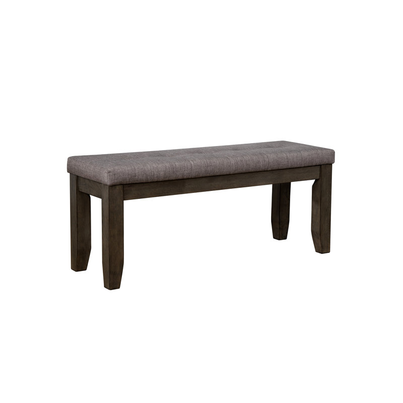 Banc chic capitonné avec pieds en bois effilés, un ajout élégant et fonctionnel à votre maison