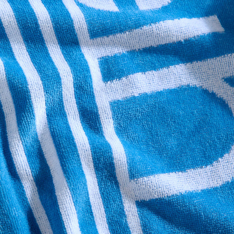 Ensemble de serviettes de plage bleues Calvin Klein, Logo à fines rayures bleu