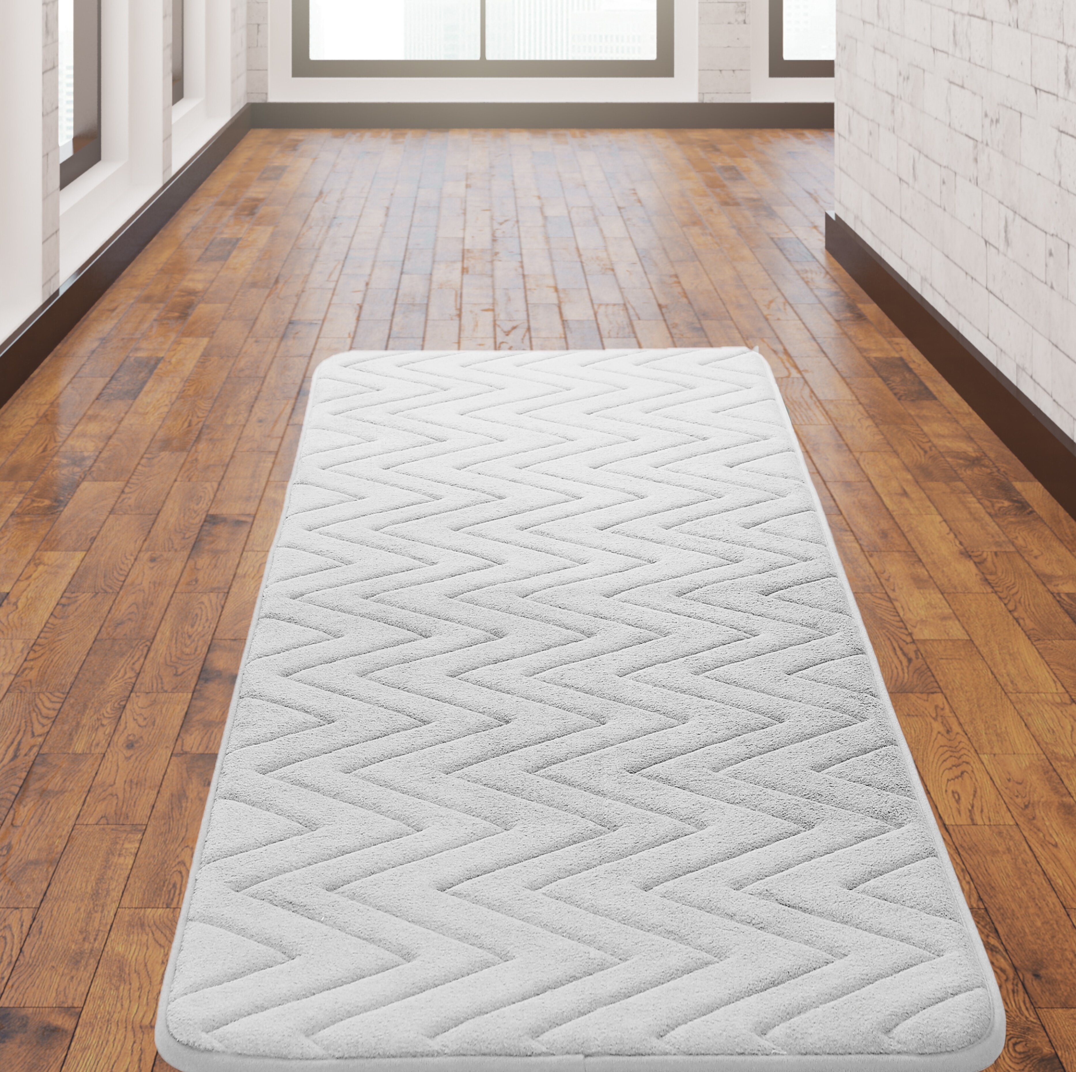 https://assets.wfcdn.com/im/20509775/compr-r85/1048/104821883/moder-bath-rug-with-non-slip-backing.jpg