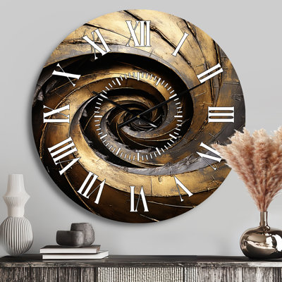 Horloge murale dorée et noir
