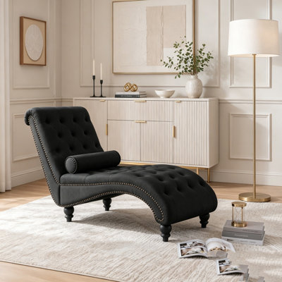 Fauteuil inclinable en velours capitonné