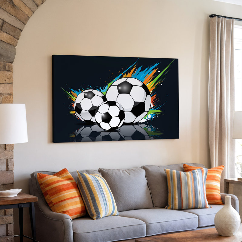 Toile, une illustration dynamique et vibrante mettant en vedette trois ballons de soccer stylisés dans un art mural