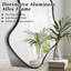 Miroir mural de luxe asymétrique, miroir de meuble-lavabo irrégulier avec cadre en aluminium-1284506066-1284506069