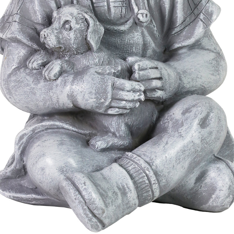 Statue garçon avec chiot