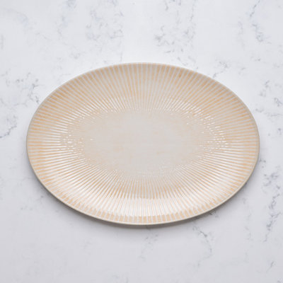 Assiette ovale en porcelaine de qualité supérieure Paros-Sand avec pied, 28 x 19,8 cm