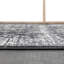Tapis persan tissé délavé rétro