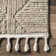Kerry Textured Geometric Tasseled Area Rug