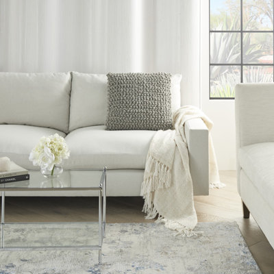 Coussin décoratif à nœuds