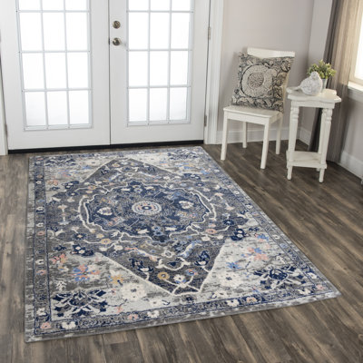 Tapis rectangulaire gris en polypropylène tissé à la machine