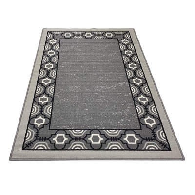 Tapis bordé antidérapant à poils courts