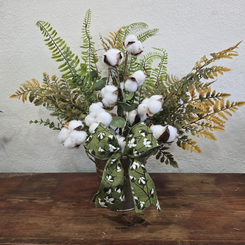 Coton et arrangement de fougères d'automne