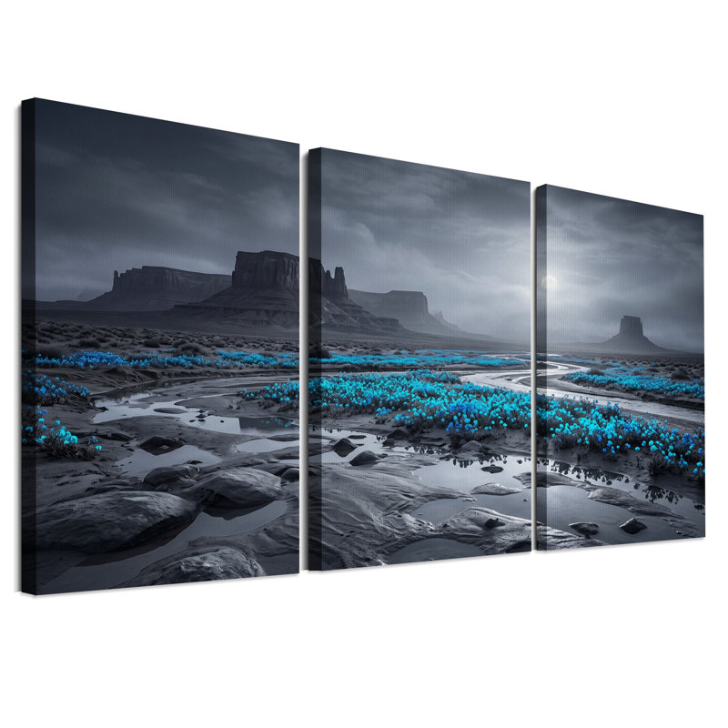 Ensemble de 3 toiles murales monochromes représentant un paysage désertique aux reflets bleus lumineux