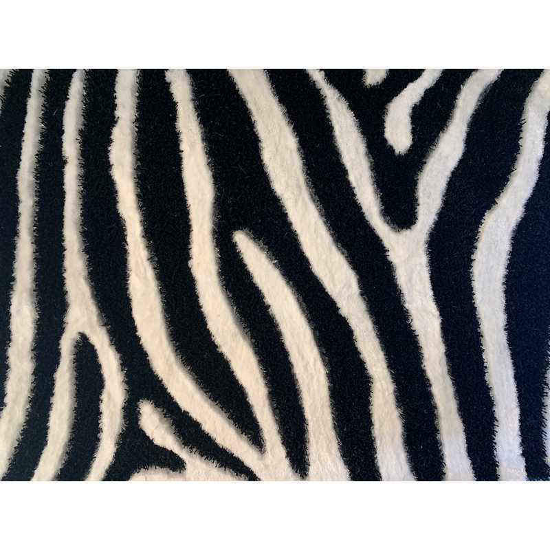 Tapis touffeté à la main avec véritable surface blanche brillante Dwain