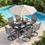 Ensemble de salle à manger de patio 7 pièces Wishon avec 6 chaises pivotantes Textilene