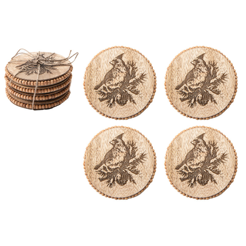 Ensemble de 4 sous-verres ronds à perles gravés d'un cardinal
