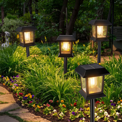 Ensemble de 4 lumières solaires de sentier, lumières de piquet solaires extérieures imperméables IP65, éclairage de paysage ampoule rétro pour jardin, cour, allée et allée