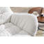 Chaise berçante rembourrée Banita Teddy avec pieds en bois massif, haut dossier-404166397