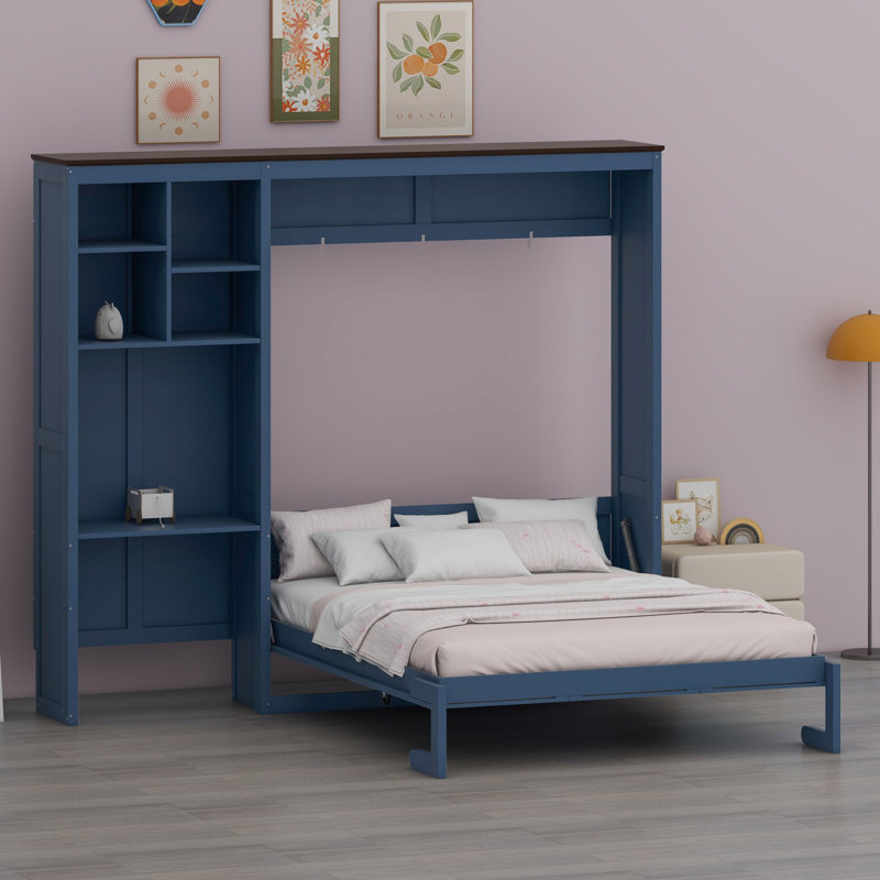 Un lit escamotable avec bureau intégré et armoire de rangement libère de l'espace au sol dans les studios et les chambres d'hôtes.
