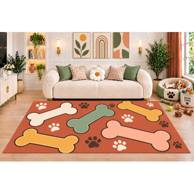 Tapis ultramince 152 x 213 cm (5 pi x 7 pi) à motifs d'os de chien en terre cuite, avec empreintes de pattes et d'os colorés. Décoration moderne pour chambre d'animal de compagnie ou salon. Dos en silicone antidérapant. Poils courts.