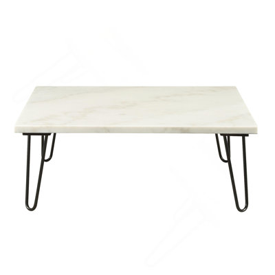 Table basse Modern Elegance en marbre blanc avec pieds à finition noire, parfaite pour les salons contemporains et les intérieurs luxueux.