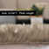 Blakes Solid Color Handmade Faux Sheepskin Area Rug in Beige