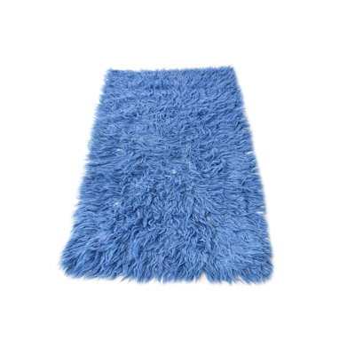 Tapis bleu Kalmanovitz