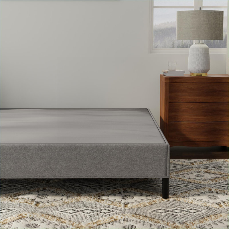 Sommier plateforme simple noir et gris rembourré, support solide compatible avec tous les types de matelas standard