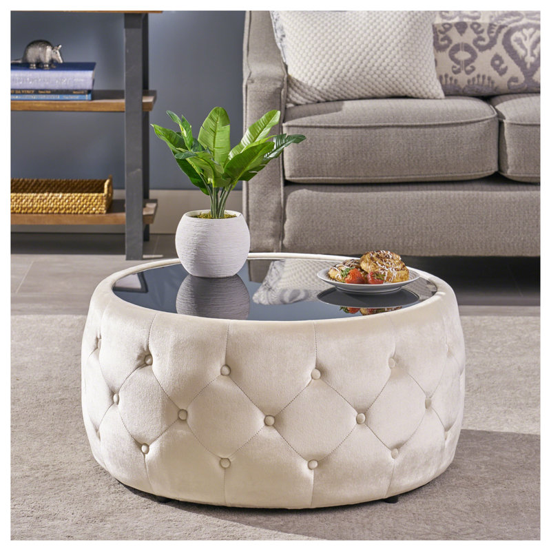 Repose-pieds beige avec rangement en velours