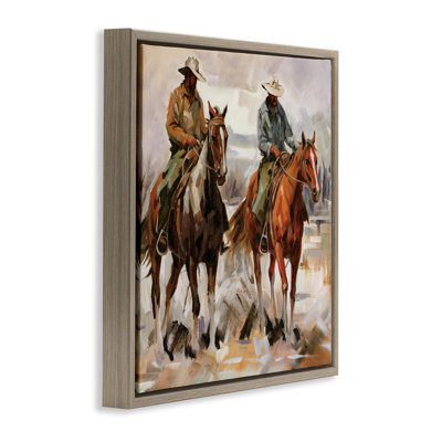  "Brush Stroke Cowboys", art mural sur toile flottante par échelle blanche