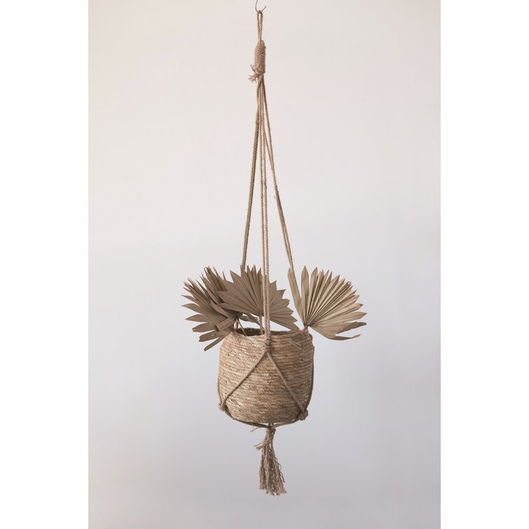 https://assets.wfcdn.com/im/20604673/resize-h755-w755%5Ecompr-r85/1239/123918017/Lonny+Round+Hanging+Straw+Planter+with+Long+Jute+Rope+and+Tassel.jpg