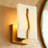 1-Light Armed Wall Sconce Gold Accent with White Faux Marble Pattern