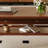Simple oval-shaped solid wood coffee table-112745385