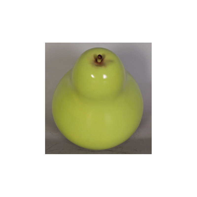 Petite statue de poire verte surdimensionnée