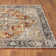 Tapis rectangulaire orange, gris et noir en polypropylène tissé à la machine