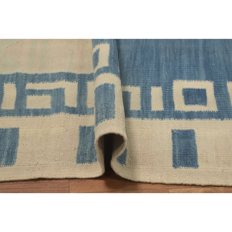 Tapis rustique bleu et crème à motifs géométriques 6 x 8