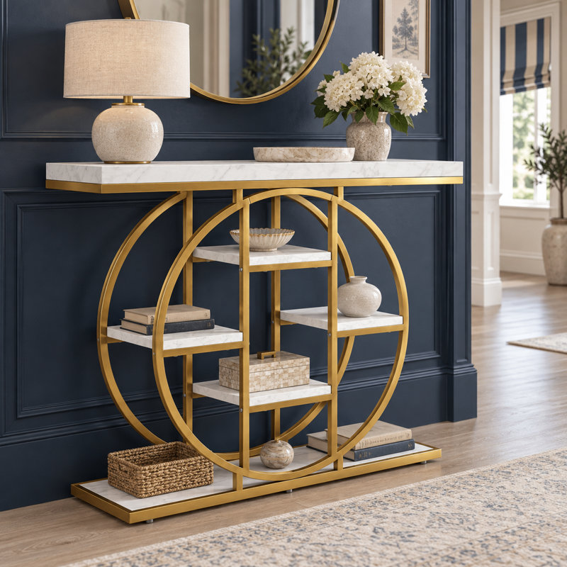 Console moderne et glamour de forme circulaire avec structure en métal et étagère ouverte, idéale pour l'entrée et le salon.