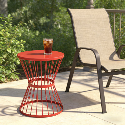 Table d'appoint vibrante en forme de sablier en acier inoxydable pour la terrasse