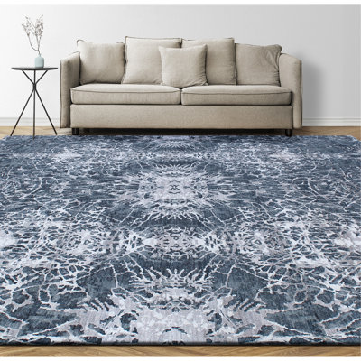 Tapis turquoise / beige noué à la main