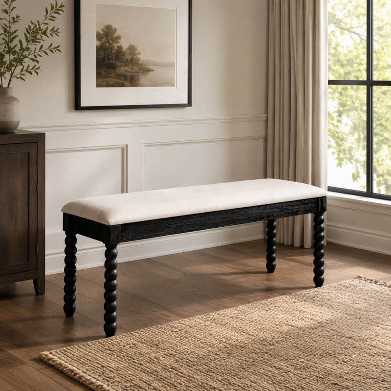 Banc de rangement en bois de style champêtre avec coussin moelleux et pieds tournés pour un confort et un style impeccables dans l'entrée